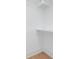 White closet with upper and lower rods and shelf at 308 Dover Ave, Charlotte, NC 28209