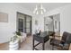 Spacious home office with wood floors and a view into another room at 308 Dover Ave, Charlotte, NC 28209