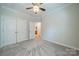 Spacious bedroom with neutral carpeting and double doors at 3101 Elmwood Dr, Monroe, NC 28110