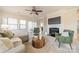 Living room with fireplace, neutral decor, and access to a deck at 3101 Elmwood Dr, Monroe, NC 28110