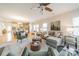 Spacious living area with hardwood floors and views into the kitchen and dining areas at 3101 Elmwood Dr, Monroe, NC 28110