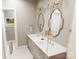 Elegant bathroom with double vanity, gold fixtures and frameless shower at 3A Oak Dr # 3, Monroe, NC 28112