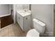 Clean bathroom with white vanity and toilet at 4616 Whispering Oaks Dr, Charlotte, NC 28213