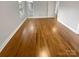 Hardwood floors and ample natural light in this bedroom at 4616 Whispering Oaks Dr, Charlotte, NC 28213