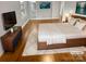 Bright bedroom featuring hardwood floors and a large bed at 4616 Whispering Oaks Dr, Charlotte, NC 28213