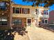 Brick front townhouse with red shutters and a small front yard at 4663 Old Lantern Way, Charlotte, NC 28212