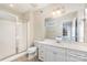 Bathroom with a shower, toilet, and white vanity at 4907 Foxbriar Trl, Charlotte, NC 28269