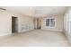 Bonus room featuring built-in shelving and access to other rooms at 4907 Foxbriar Trl, Charlotte, NC 28269