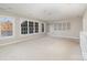 Spacious bonus room with built-in shelving and lake views at 4907 Foxbriar Trl, Charlotte, NC 28269