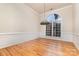 Formal dining room with hardwood floors and bay window at 4907 Foxbriar Trl, Charlotte, NC 28269