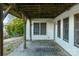 Covered patio with concrete flooring and exterior access at 4907 Foxbriar Trl, Charlotte, NC 28269