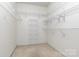 Large walk-in closet with wire shelving at 4907 Foxbriar Trl, Charlotte, NC 28269