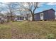 Yard with shed and small home at 503 Birch St, Lowell, NC 28098