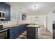 Updated kitchen with butcher block countertops and island at 503 Birch St, Lowell, NC 28098