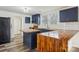 Modern kitchen with granite island and updated cabinetry at 503 Birch St, Lowell, NC 28098