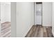 Bright laundry room with washer and dryer, and wood-look vinyl flooring at 503 Birch St, Lowell, NC 28098