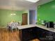 Bright dining area adjacent to the kitchen at 535 Springs East Rd, Lincolnton, NC 28092