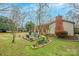 Backyard patio with seating and landscaping at 535 Tyson St, Charlotte, NC 28209