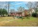 Fenced backyard with patio and seating area at 535 Tyson St, Charlotte, NC 28209