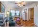 Bright bedroom with wood floors, built-in shelving and a comfortable seating area at 535 Tyson St, Charlotte, NC 28209