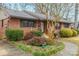 Brick ranch house with landscaped yard and walkway at 535 Tyson St, Charlotte, NC 28209