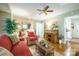 Living room with hardwood floors, sofa and antique desk at 535 Tyson St, Charlotte, NC 28209