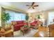 Bright living room with hardwood floors and a comfy sofa at 535 Tyson St, Charlotte, NC 28209