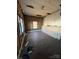 Unfinished bedroom with wood floors and exposed walls at 543 Salisbury St, Wadesboro, NC 28170