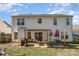 Home's backyard with patio, pergola, and grill at 5767 Dove Point Dr, Concord, NC 28025