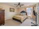 Bedroom with a bed, TV, and ceiling fan at 5767 Dove Point Dr, Concord, NC 28025