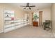 Bedroom with built-in shelving and sitting area at 5767 Dove Point Dr, Concord, NC 28025