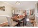 Open concept dining area with hardwood floors and kitchen view at 5767 Dove Point Dr, Concord, NC 28025