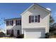 Two-story house with white siding, maroon shutters, and a two-car garage at 5767 Dove Point Dr, Concord, NC 28025