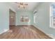 Bright living room with light walls and hardwood floors at 6 Walnut St, Great Falls, SC 29055