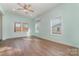 Bright living room with light walls and hardwood floors at 6 Walnut St, Great Falls, SC 29055