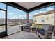 Relaxing screened porch with wicker seating and backyard view at 6297 Raven Rock Dr, Denver, NC 28037