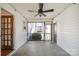 Relaxing screened porch with ceiling fan overlooking the backyard at 670 Sylvan Sw St, Concord, NC 28025