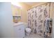 Clean bathroom with white vanity and shower/tub combo at 6710 Elm Forest Dr, Charlotte, NC 28212