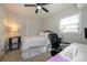 Bright bedroom with a comfortable bed, workspace, and ample natural light at 7445 Briardale Dr, Charlotte, NC 28212