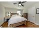 Spacious bedroom featuring hardwood floors and ample natural light at 7445 Briardale Dr, Charlotte, NC 28212