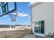 View of home's back elevation and backyard, with basketball hoop at 7822 Meridale Forest Dr, Charlotte, NC 28269