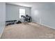 Bedroom with home office setup and carpet flooring at 7822 Meridale Forest Dr, Charlotte, NC 28269