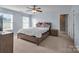 Bright bedroom with wood-toned furniture and en-suite bathroom at 7822 Meridale Forest Dr, Charlotte, NC 28269