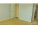Bedroom with neutral carpet and a closet, ready for personalization and comfort at 7822 Meridale Forest Dr, Charlotte, NC 28269