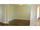 Bright living room with hardwood floors, ample natural light, and neutral paint at 7822 Meridale Forest Dr, Charlotte, NC 28269