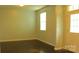 Bright living room with hardwood floors, ample natural light, and neutral paint at 7822 Meridale Forest Dr, Charlotte, NC 28269