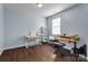 Home office with wood floors and two workspaces at 7822 Meridale Forest Dr, Charlotte, NC 28269