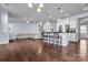 Open living space combining kitchen and living areas at 7822 Meridale Forest Dr, Charlotte, NC 28269