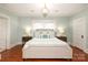 Spacious bedroom with hardwood floors and a neutral color palette at 808 E Worthington Ave, Charlotte, NC 28203