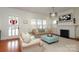 Bright living room featuring a fireplace and comfortable seating at 808 E Worthington Ave, Charlotte, NC 28203